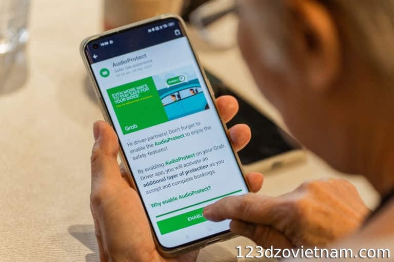 How do foreigners register for Grab?