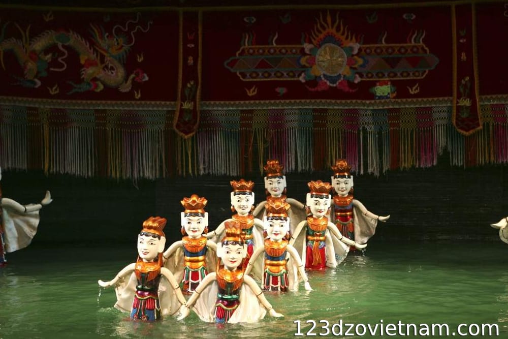 Watch a water puppet show at the Golden Dragon Theatre