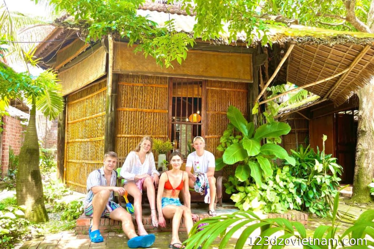 Taking photos with friends at the homestay