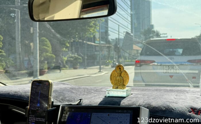 Driving a taxi on the roads of the cities of Vietnam