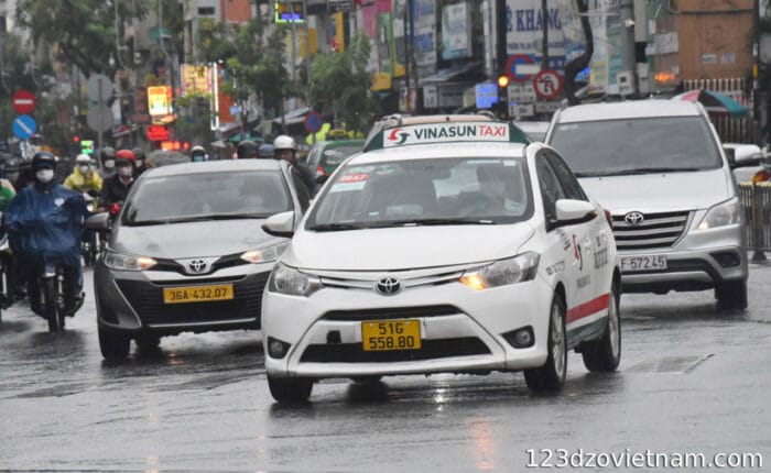 Many taxis on road in the city of Vietnam, Hanoi